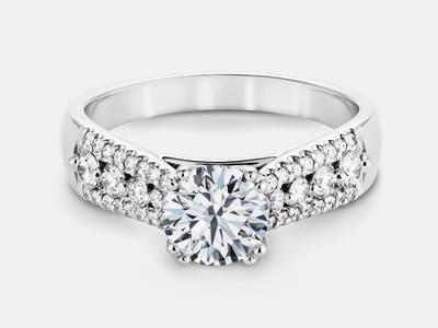 Mya style diamond engagement ring set with 0.40 carats of side diamonds. Center stone sold separate. $2450.00