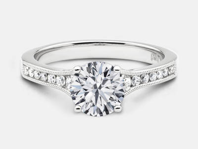The Heather style diamond engagement ring set with 0.27 carats of round brilliant cut side diamonds. Center stone sold separate. $1550.00